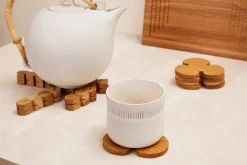 Clumsy Hans pannenonderzetter, Eikenhout