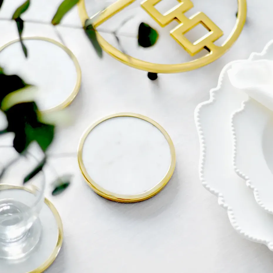 Hilke Collection glasonderzetters 4-pack, Wit marmer-massief messing