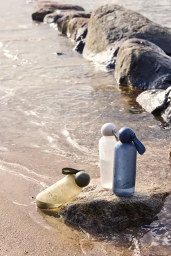 Tom waterfles 65 cl, Beige